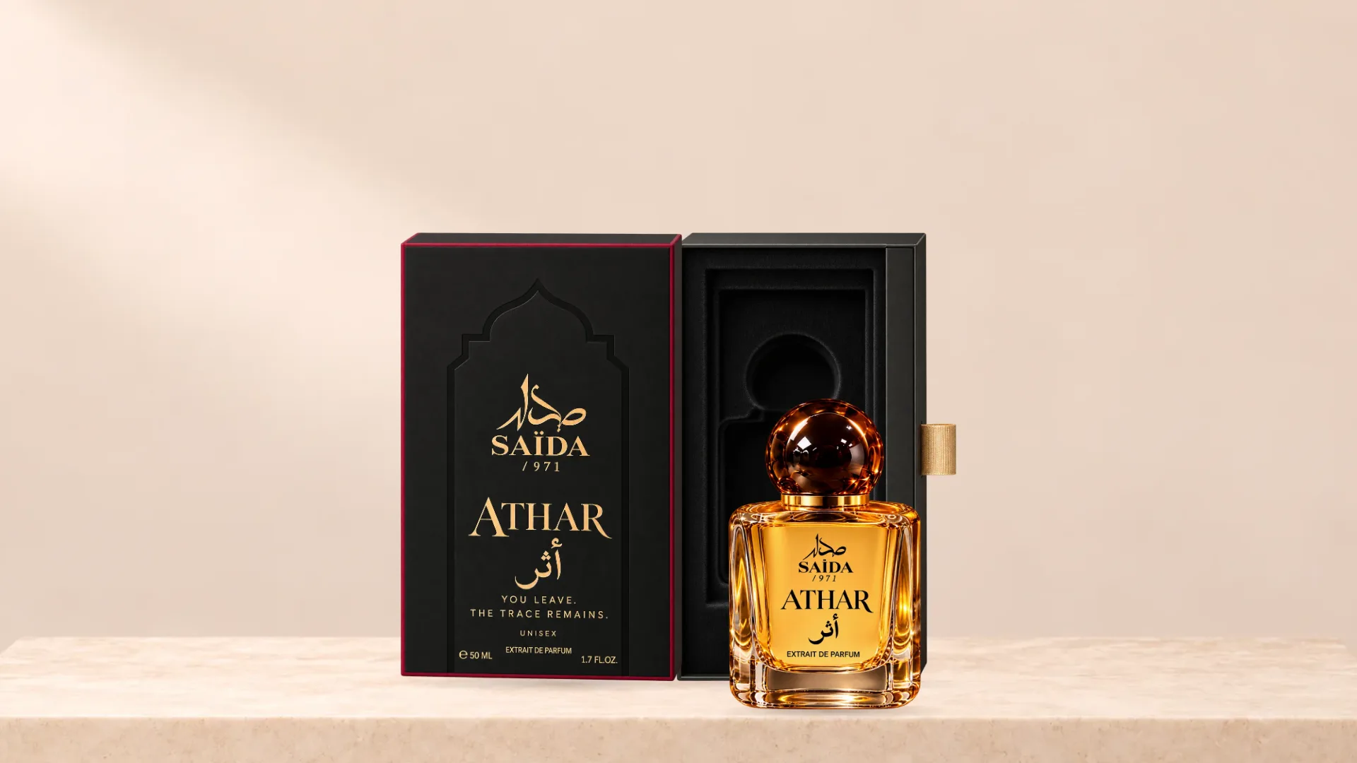 Athar standing beside its open box on a pale stone plinth.